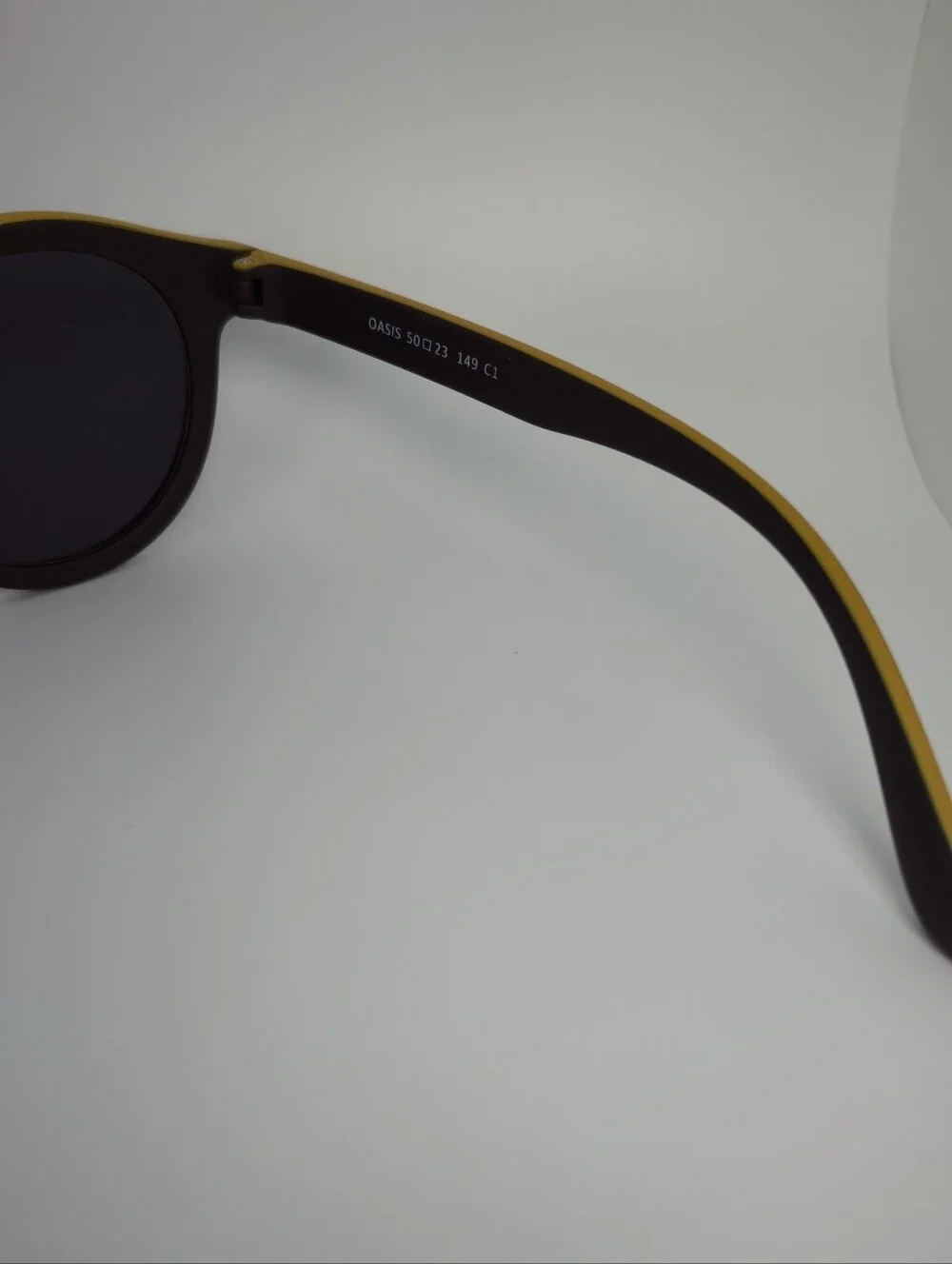 Oasis. Men's Black Round Frame. Deep Chocolate, Yellow Top.